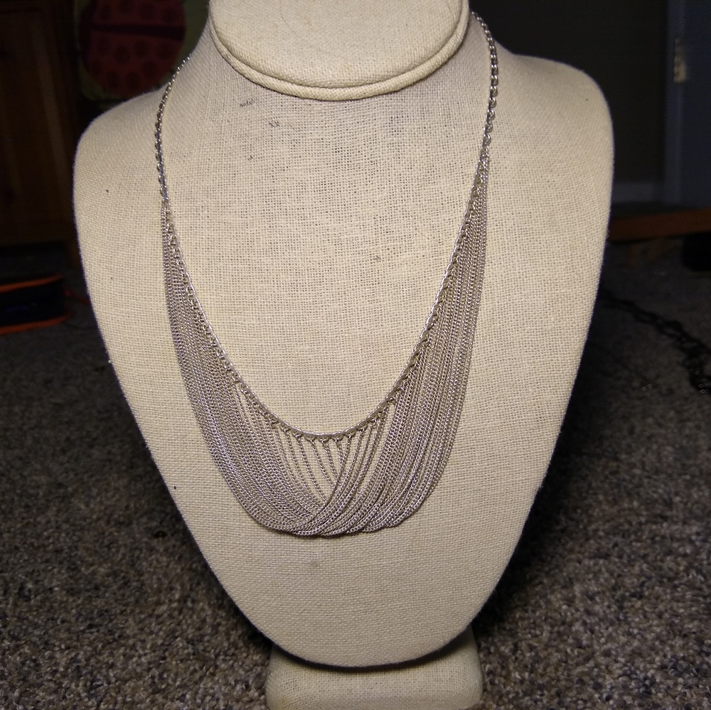 Silver colored dangle necklace